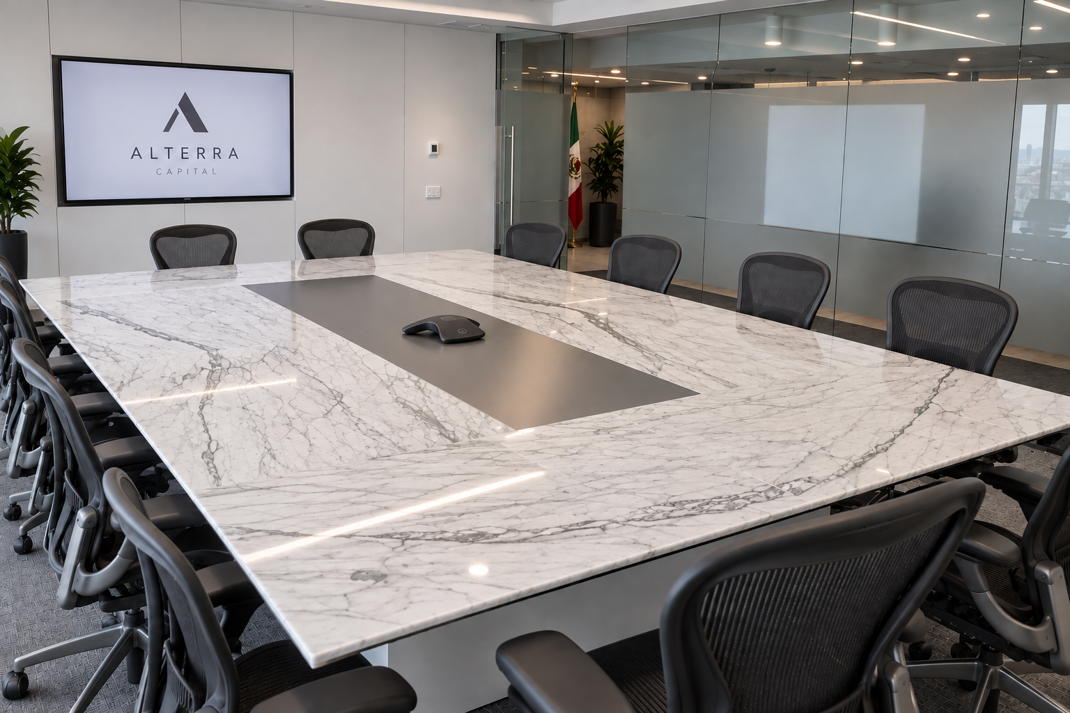 Sala de juntas corporativa con mesa de mármol, sillas ejecutivas y pantalla de presentación